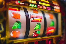 Mobile interface showing number prediction table selection and live dealer video stream on slot royal88